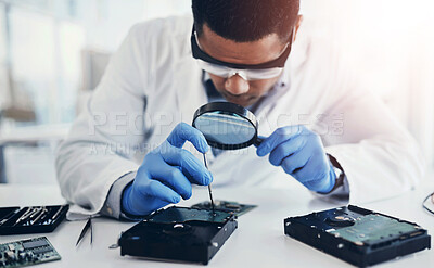 Buy stock photo Computer, hardware and man in lab with magnifying glass in motherboard maintenance, repair or engineering. IT, research and electronic technician with circuit board, tools and assessment at desk.