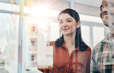 Buy stock photo Business people, glass wall and planning with teamwork, brainstorming and decision in office. Employees, man and woman with cooperation, smile and collaboration for project and company development