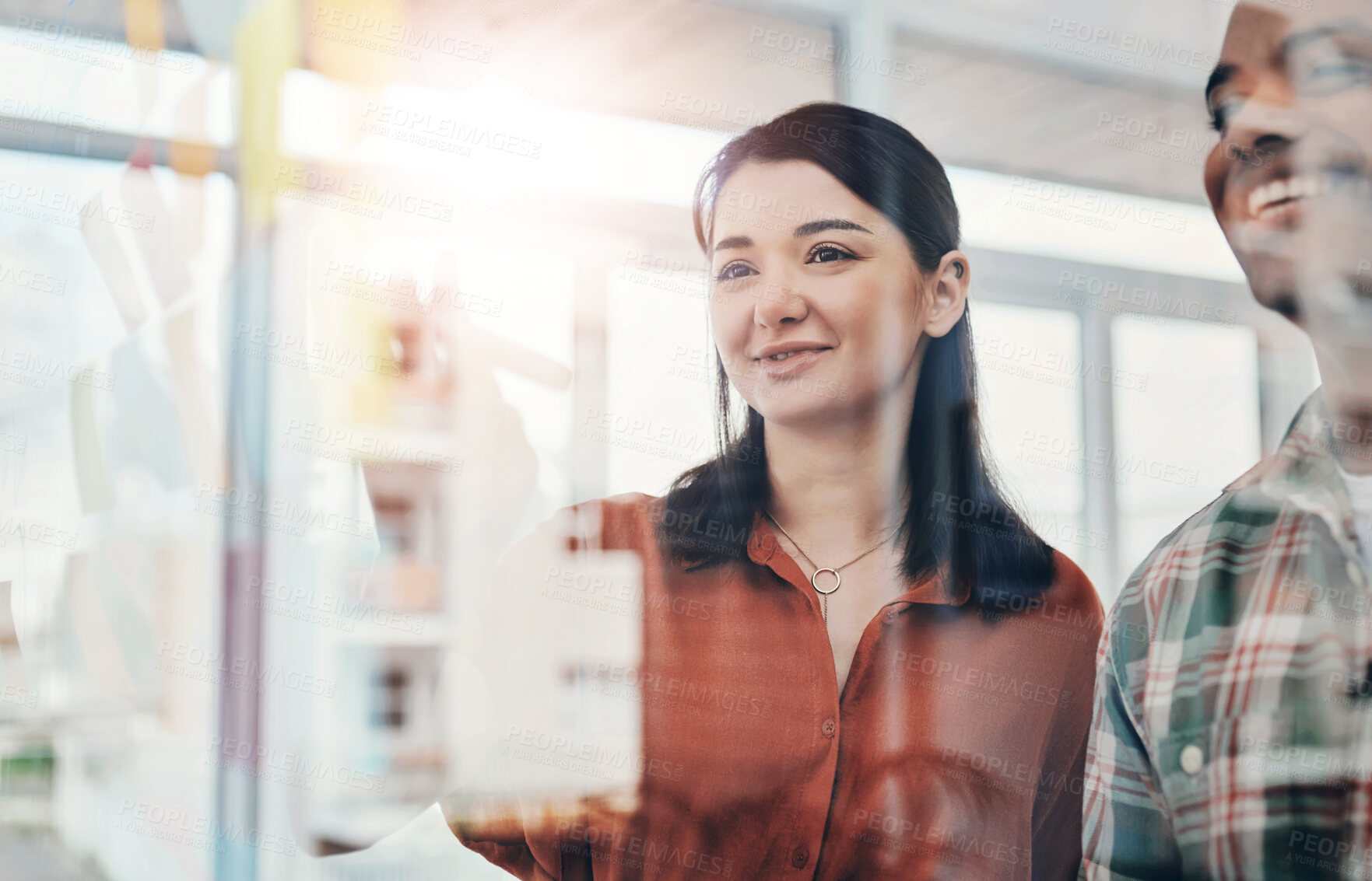 Buy stock photo Business people, glass wall and planning with teamwork, brainstorming and decision in office. Employees, man and woman with cooperation, smile and collaboration for project and company development