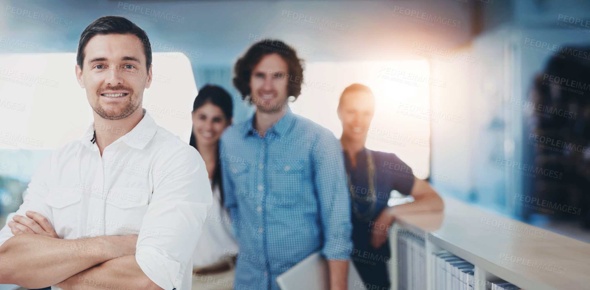 Buy stock photo Portrait, team leader and happy businessman with arms crossed in office for pride or about us. Face, smile and confident manager with group at startup for cooperation, solidarity or creative director