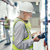 Shelf Check Mature woman, shelf check and tablet scan with barcode, checklist and ...