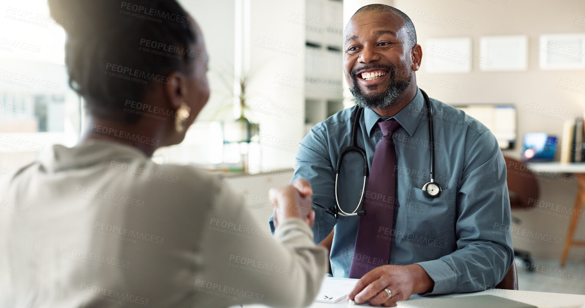 Buy stock photo Handshake, healthcare or welcome with doctor and patient in office at hospital for checkup or consulting. Hello, smile or thank you with medical professional man and woman shaking hands in clinic