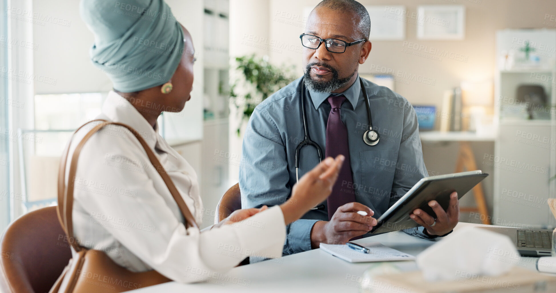 Buy stock photo Tablet, consultation and black woman with doctor in clinic for medical diagnosis or wellness advice. Discussion, digital technology and female patient with healthcare worker for checkup in hospital.