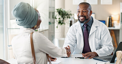 Buy stock photo Handshake, healthcare or thank you with doctor and patient in office at hospital for appointment or consulting. Smile, welcome and medical professional man shaking hands with woman in clinic