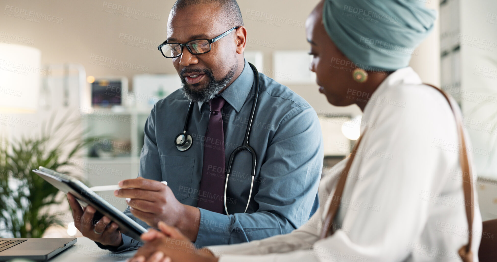 Buy stock photo Tablet, conversation and black woman with doctor in hospital for medical diagnosis or wellness advice. Discussion, digital technology and female patient with healthcare worker for checkup in clinic.