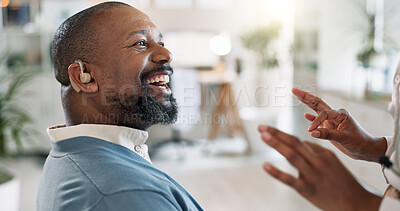 Buy stock photo Black man, happy and hearing aid with gratitude, medical support and care with implant for sound and audio. Deaf, back and check of patient with disability in hospital for technology and installation