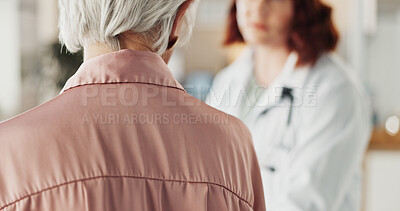 Buy stock photo Doctor, woman and back for consulting with senior patient for advice, diagnosis and talking with for healthcare at clinic. Senior person, medic and conversation for progress, support in hospital