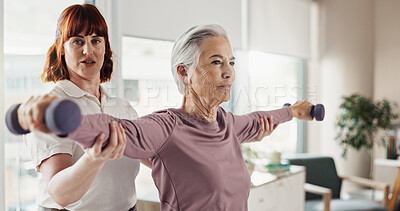 Buy stock photo Stretching, physiotherapist and senior woman with weights for wellness, mobility and physical therapy. Healthcare, medical care and person with mature patient for strength, rehabilitation and support