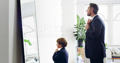 Buy stock photo Father, child and help with tie for suit by mirror for event preparation, learning fashion or ready in family home. Dad, kid and boy in formal necktie, clothes and dressing with reflection of parent
