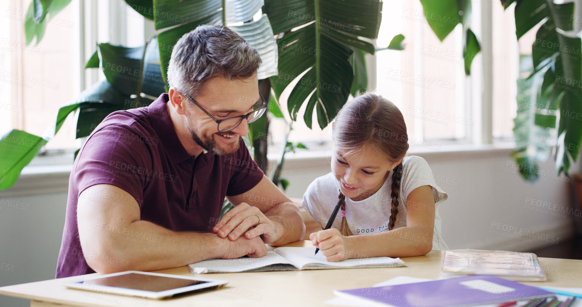 Buy stock photo Writing, dad and child with homework, home and studying for project, helping and education for daughter. House, learning and man with kid, knowledge and girl with assignment, growth and development