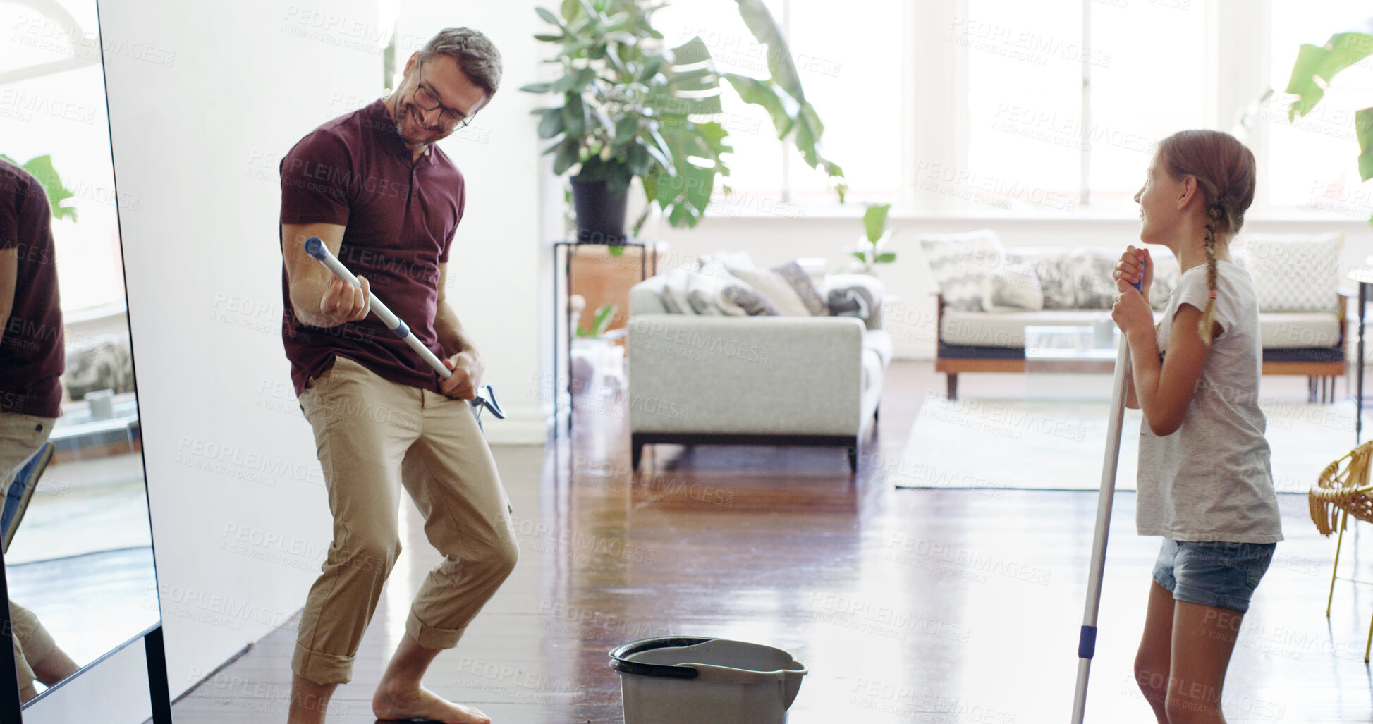 Buy stock photo Father, child and cleaning fun in home with air guitar, family and youth development from learning. Love, support and care with mop, dancing and floor washing with happy, smile and girl helping