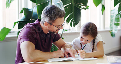 Buy stock photo Education, dad and child with homework, home and studying for project, writing and help for daughter. House, learning and man with kid, knowledge and girl with assignment, growth and development