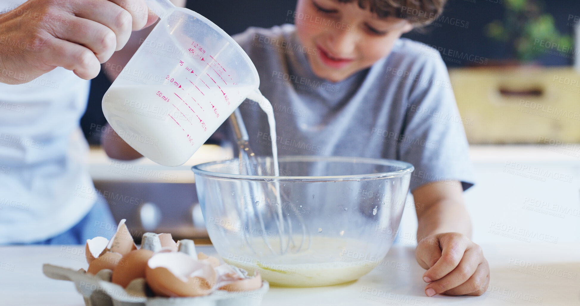 Buy stock photo Child, baking and kitchen with help, milk and love in family home with cooking and food. Learning, happy boy and bowl for cake with bonding, smile and youth development with ingredients and dessert