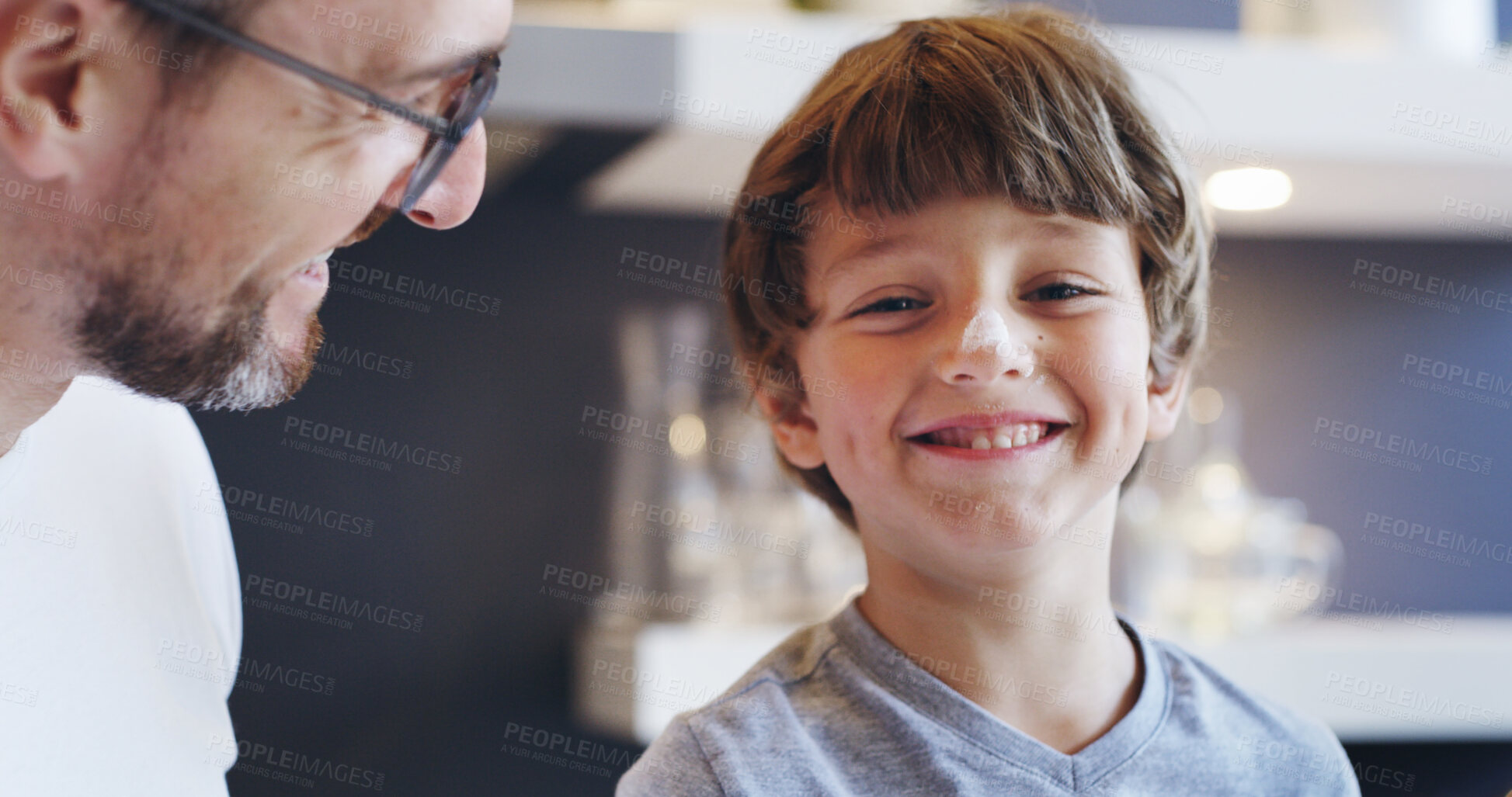 Buy stock photo Child, happy and flour in kitchen with father, playful and fun cooking breakfast on weekend. Young boy, portrait and man in home for bonding, relationship development and messy morning with smile
