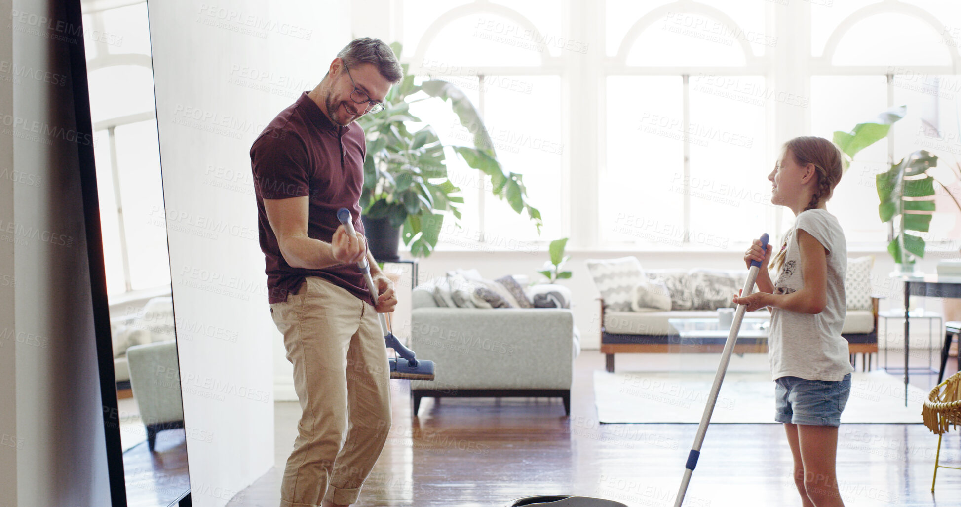 Buy stock photo Dad, child and cleaning fun in home with game, family and youth development from learning to mop. Love, support and care with music, dancing and floor washing with happy, smile and girl helping
