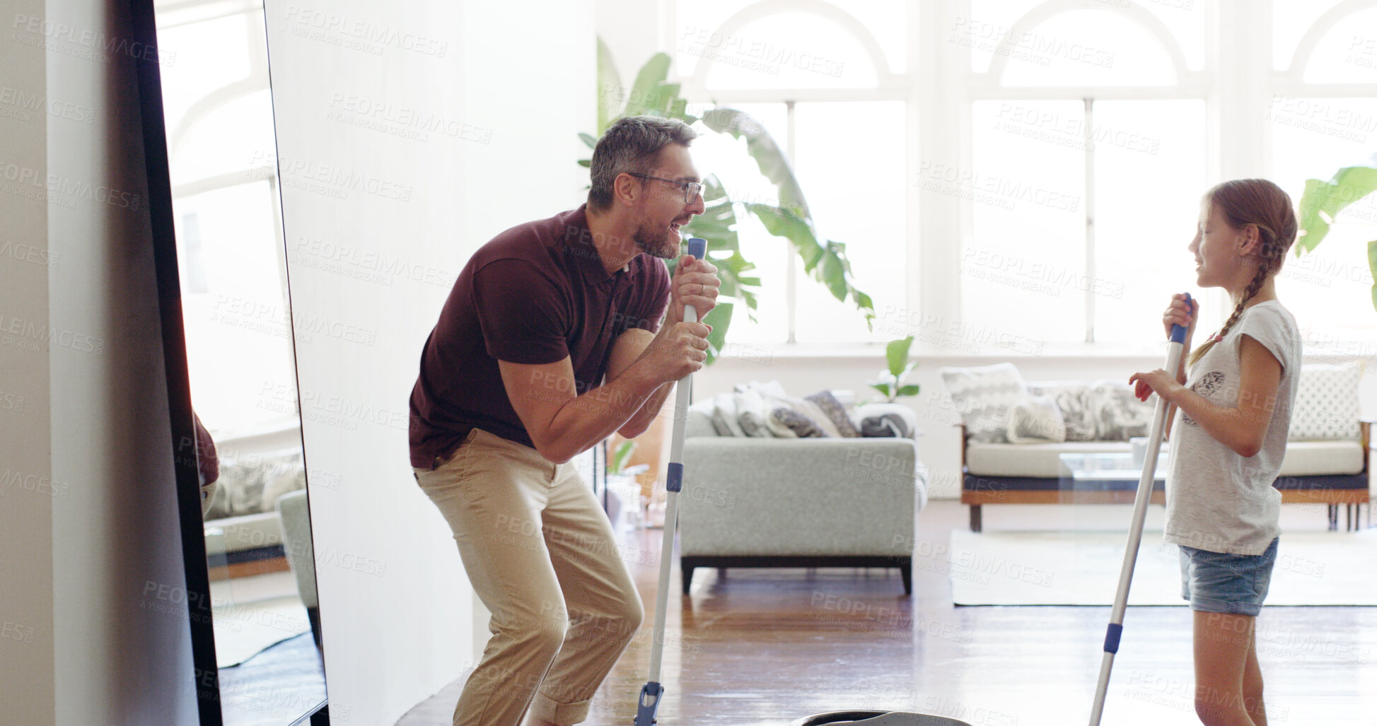 Buy stock photo Father, child and cleaning fun at home with singing, family and youth development from chore learning. Love, support and care with mop, game and floor washing with happy, smile and girl helping