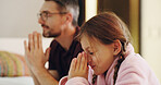 Bedroom, prayer or worship with father and daughter together in home for bedtime faith or religion. Belief, gratitude or trust with girl child and man parent praying to God or Jesus in apartment