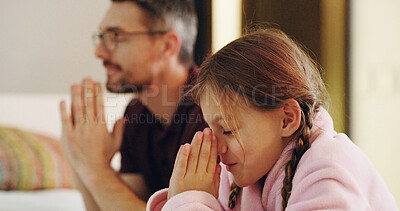 Buy stock photo Bedroom, prayer or worship with father and daughter together in home for bedtime faith or religion. Belief, gratitude or trust with girl child and man parent praying to God or Jesus in apartment