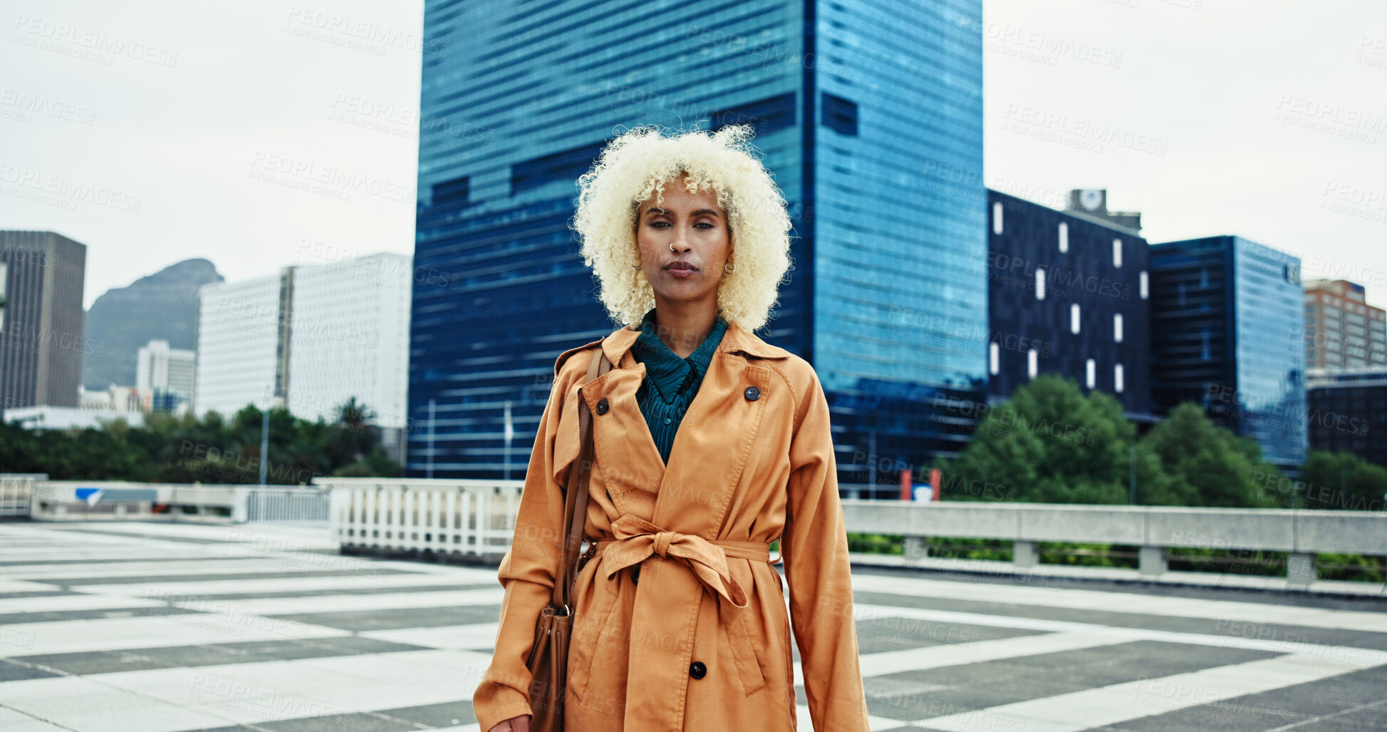 Buy stock photo City, fashion designer and woman with portrait or confidence in trendy coat in New York alone. Outdoor, serious or creative female person in urban town for travel, commute or sightseeing on holiday