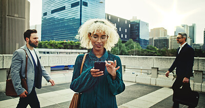 Buy stock photo Corporate, woman and typing with phone outdoor for communication, travel location and transport service. People, walking and mobile contact of texting app, networking and reading notification in city