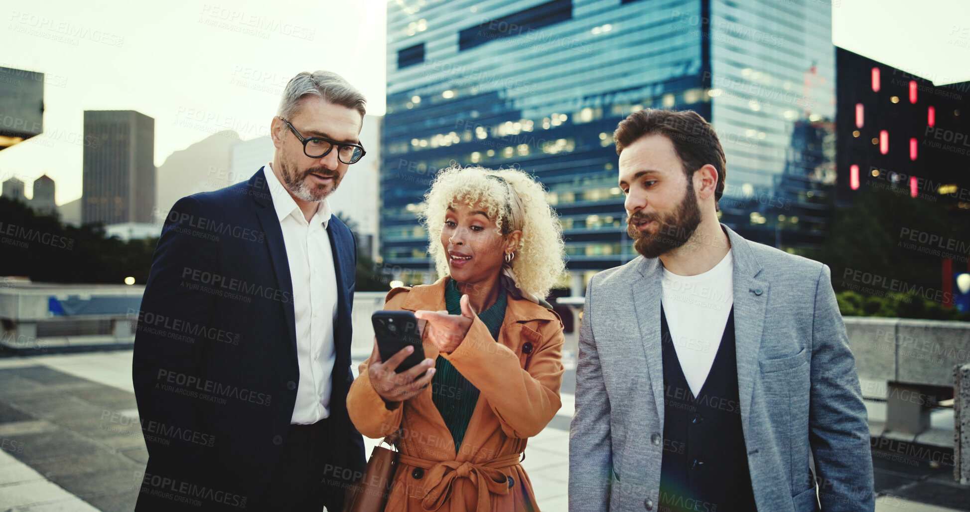Buy stock photo City, team and business people with discussion for smartphone, connectivity or online communication. Walking, employees or smile with mobile app for scroll, reading notification or networking outdoor