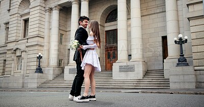 Buy stock photo Wedding, dance and couple in city for love at marriage ceremony, celebration and court certificate. Romance, bride and groom and happy man and woman in town for commitment, partnership and promise
