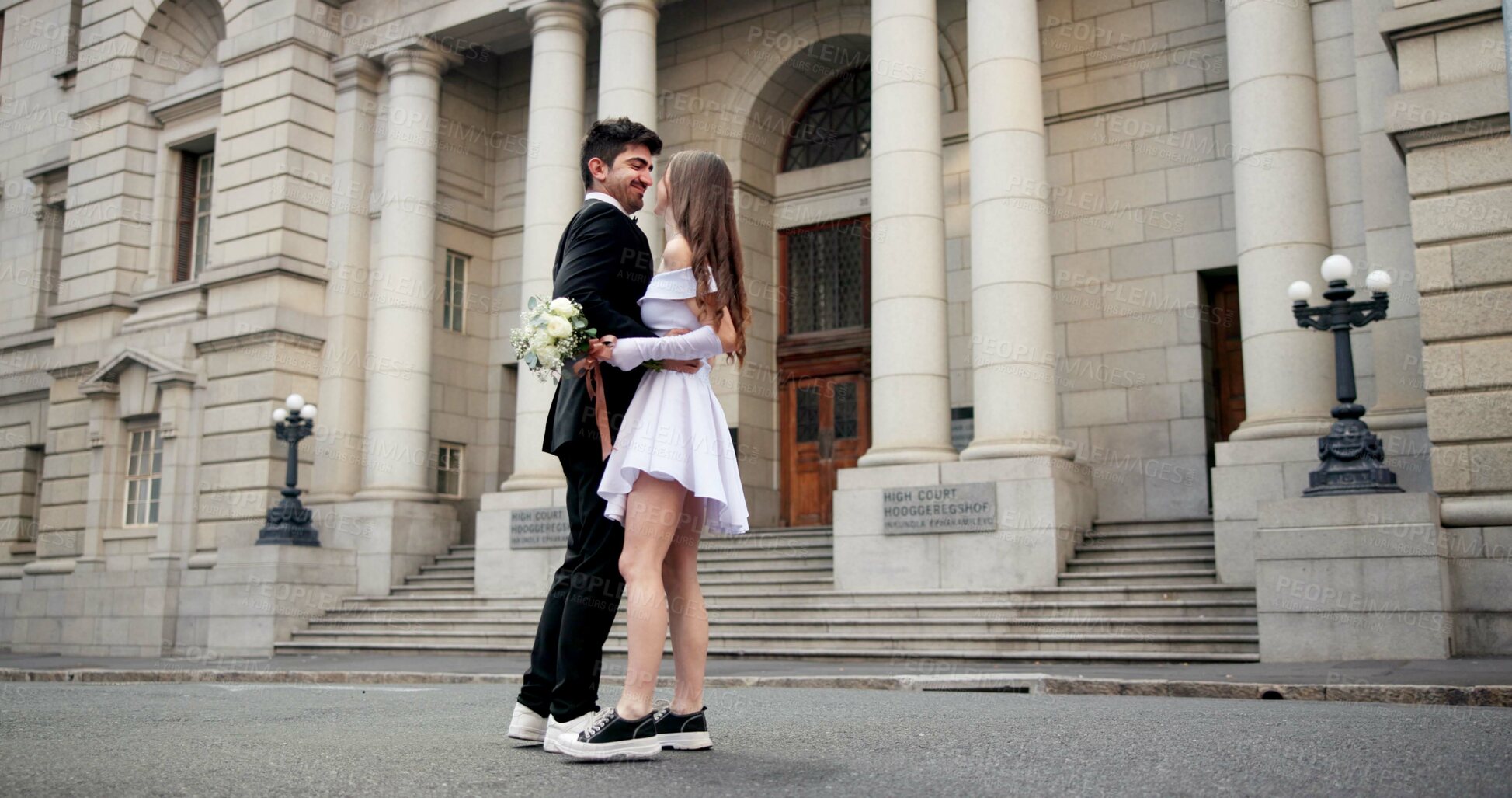 Buy stock photo Wedding, dance and couple in city for love at marriage ceremony, celebration and court certificate. Romance, bride and groom and happy man and woman in town for commitment, partnership and promise
