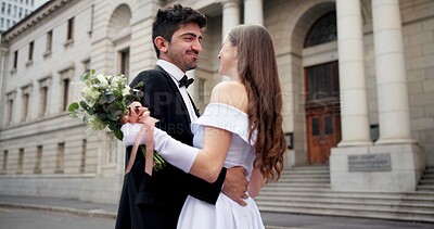 Buy stock photo Wedding, hug and couple in city at marriage ceremony, celebration and event for romance. Love, affection and man and woman embrace for commitment, partnership and promise for court certificate
