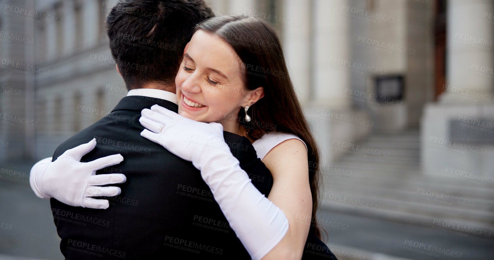 Buy stock photo City, building and happy couple at wedding with hug, love and bride with groom in street together. Urban romance, man and woman at court marriage with embrace, commitment and outdoor celebration.