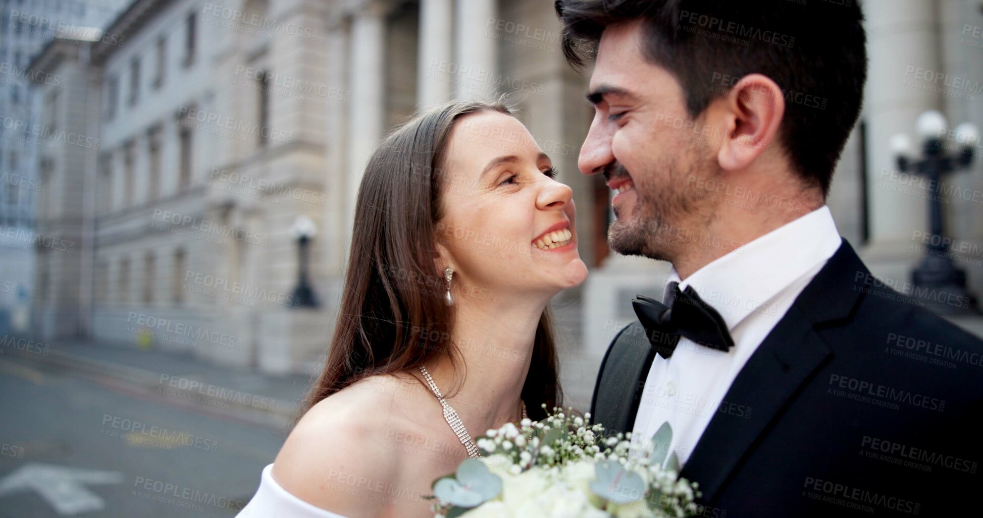 Buy stock photo Wedding, happy and couple in city with smile for marriage ceremony, celebration and event. Romance, affection and man and woman embrace for commitment, partnership and promise for court certificate