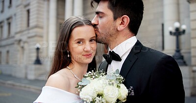 Buy stock photo Wedding, kiss and portrait of couple in city at marriage ceremony, celebration and love. Romance, affection and man and woman embrace for commitment, partnership and promise for court certificate