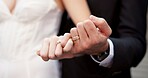 Holding hands, ring and couple on wedding with promise, celebration and marriage commitment. People, bride and groom with jewellery for partnership, relationship loyalty and ceremony announcement