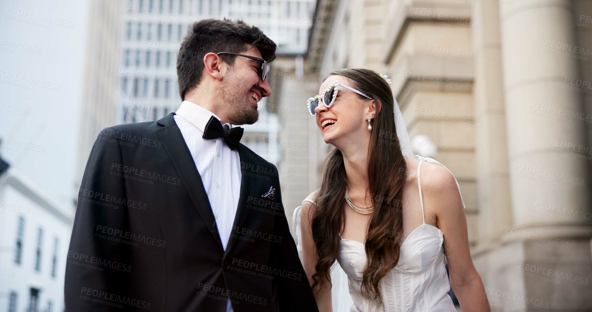 Buy stock photo Happy, walking and couple in city for wedding at town hall for marriage certificate, ceremony and celebration. Holding hands, love and man and woman at court for commitment, promise and partnership