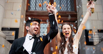 Buy stock photo Excited, couple and holding hands on wedding with bouquet, celebration success and marriage commitment. Happy, people and flowers with freedom for partnership, relationship love and romance ceremony