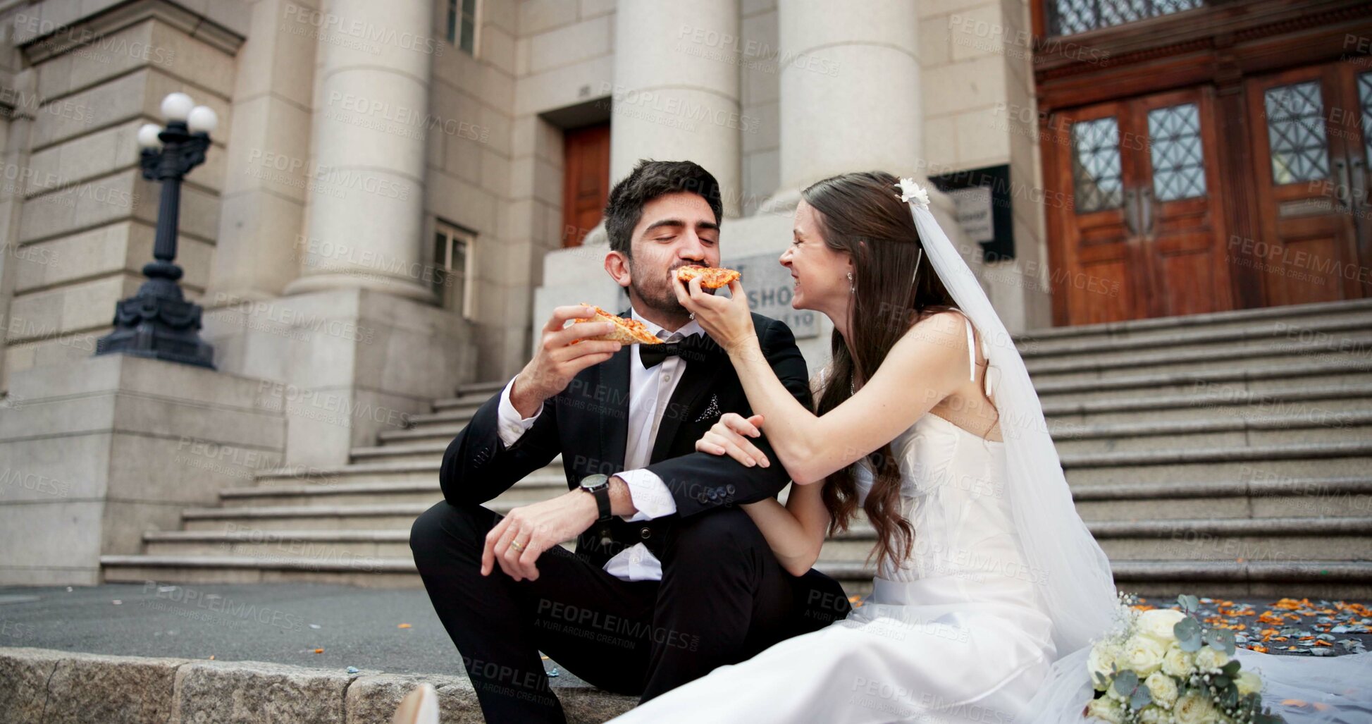 Buy stock photo Couple, wedding and eating pizza in city with smile, feeding and care with celebration, milestone and love. People, man and woman with fast food for marriage, commitment and event by court in Italy