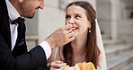 City, smile and couple at wedding with cake, love and happy bride with groom in street together. Urban romance, man and woman at court marriage event, eating or sharing dessert at outdoor celebration