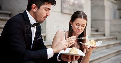 Buy stock photo Wedding, city and couple with cake at courthouse with bride, stairs and modern fashion for celebration. Sitting, people and marriage event for commitment, loyalty and trust with food and eating