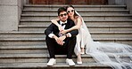 Wedding, city and couple portrait on steps at courthouse with bride, love and modern fashion for celebration. Sitting, people and marriage event for commitment, loyalty and trust with sunglasses