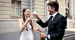 Wedding, toast and couple in city with champagne at ceremony, celebration and commitment. Romance, alcohol drinks and man and woman in town for promise, partnership and marriage certificate at court