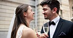 Wedding, cheers and couple in city with champagne at ceremony, celebration and commitment. Romance, alcohol toast and man and woman in town for promise, partnership and marriage certificate at court