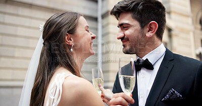 Buy stock photo Wedding, cheers and couple in city with champagne at ceremony, celebration and commitment. Romance, alcohol toast and man and woman laughing together in town for promise, partnership and marriage