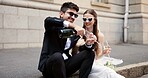 Wedding, champagne and bride and groom in city for ceremony, celebration and commitment. Romance, alcohol toast and man and woman in town for promise, partnership and marriage certificate at court