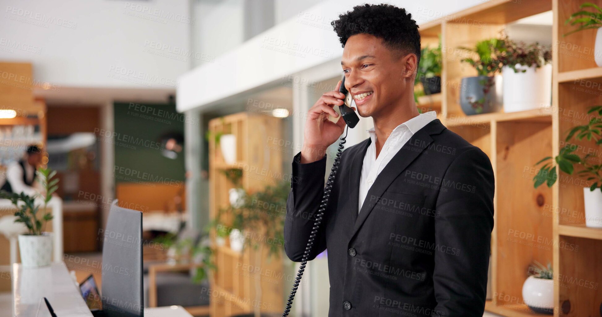 Buy stock photo Hotel, reception and booking call of concierge with African man, customer care and hospitality enquiry. Staff, service and question at lobby desk with conversation, helping and guest support job