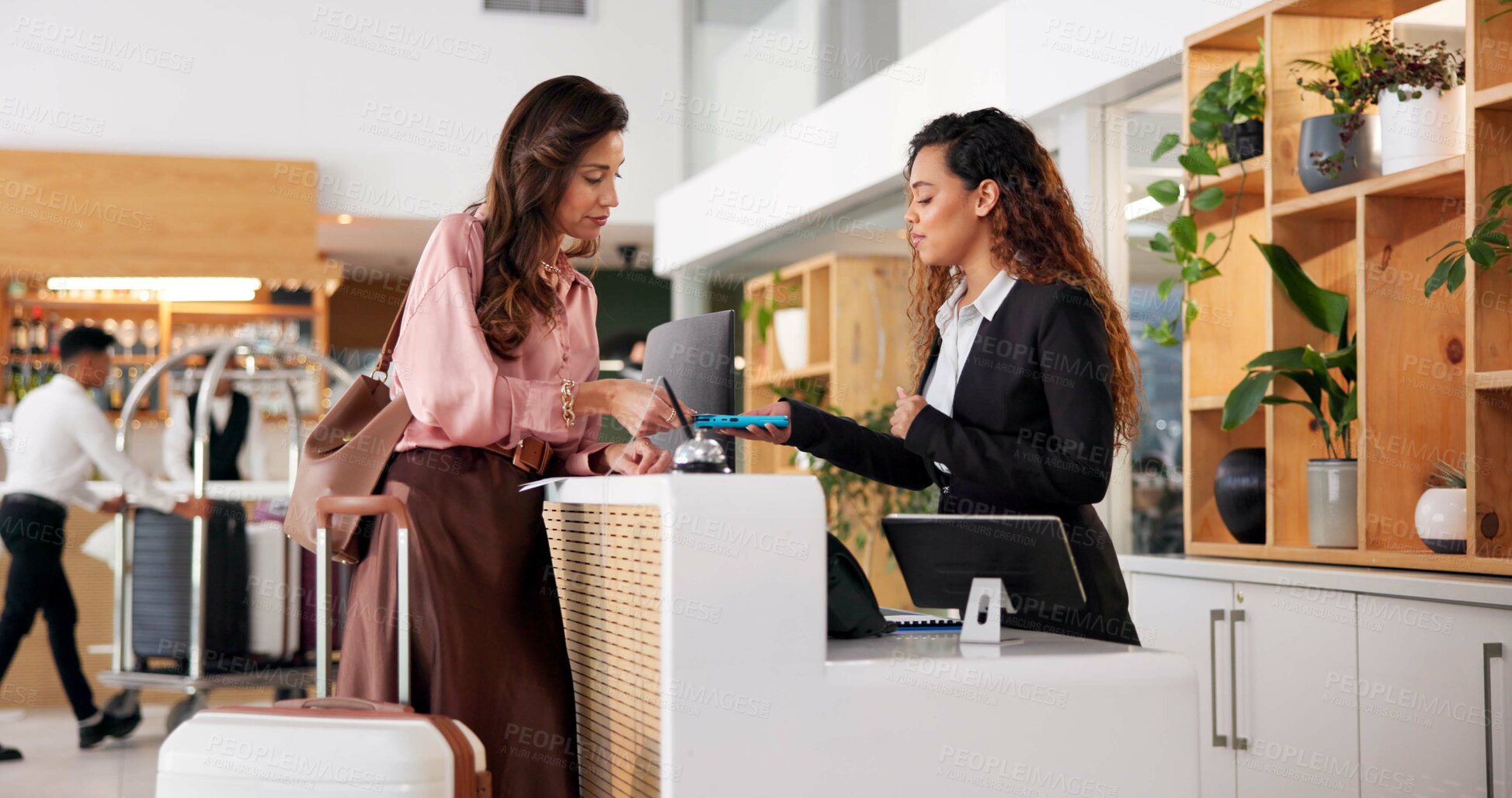 Buy stock photo Hotel, receptionist and woman with pay machine for booking, guest room service and reservation. Hospitality, front desk and client with concierge for pos payment, transaction and purchase in lobby