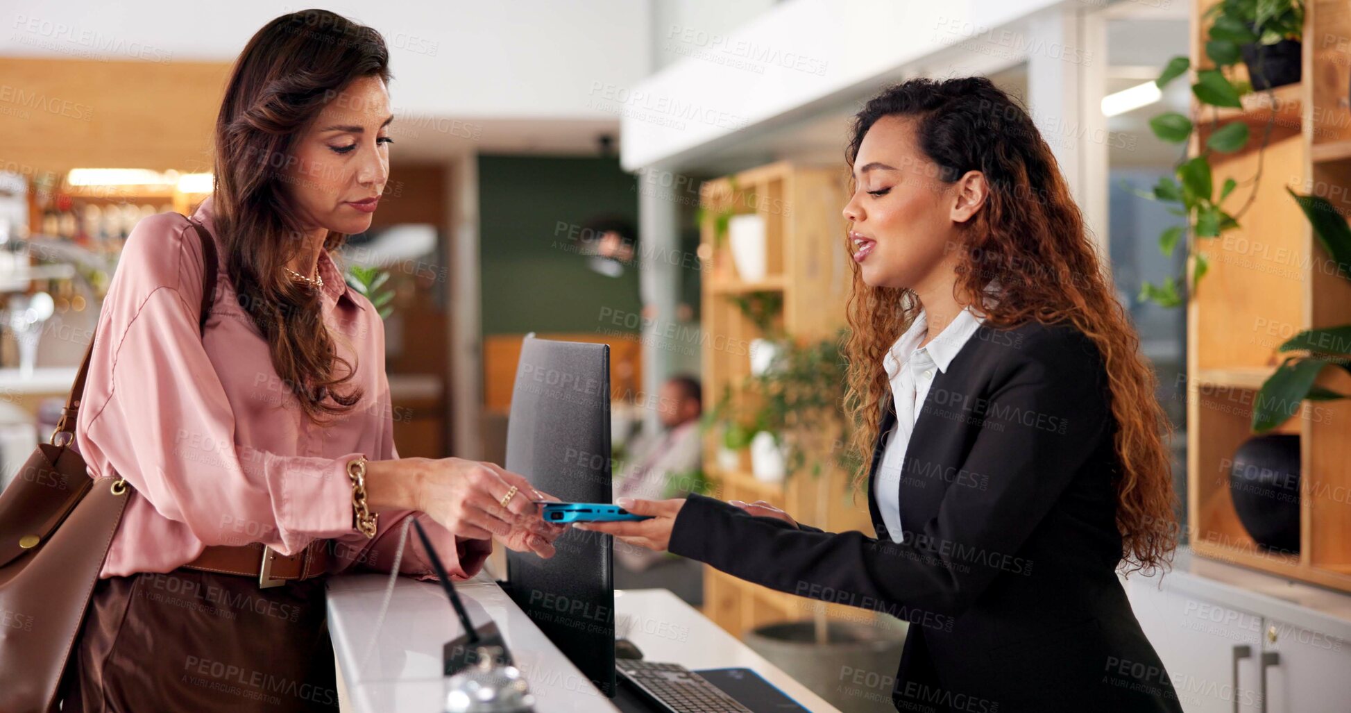 Buy stock photo Hotel, receptionist and woman with card machine for booking, guest room service and reservation. Hospitality, front desk and client with concierge for pos payment, transaction and purchase in lobby