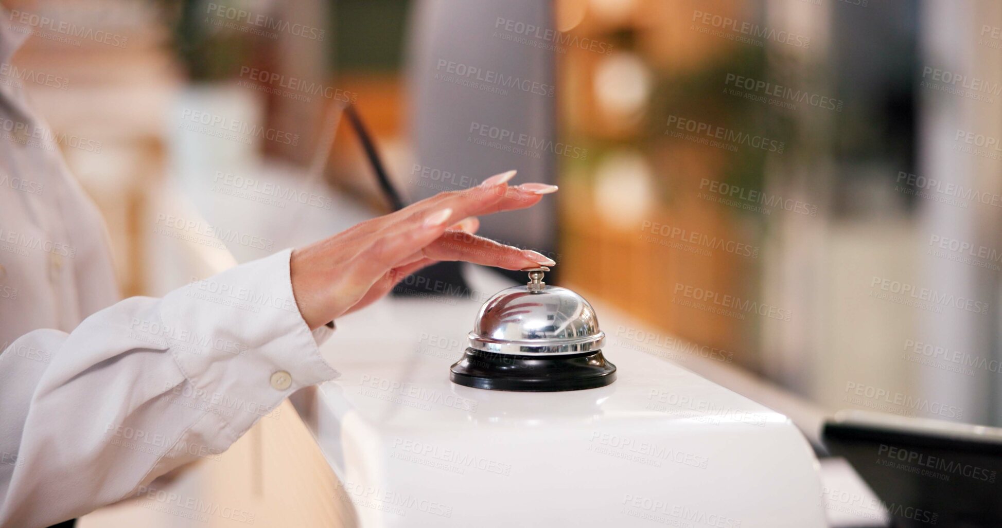 Buy stock photo Hands, hotel and bell ring with woman at reception with waiting for assistance, customer service and desk help. Hospitality, lobby and booking with noise for attention, support and call for staff