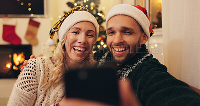 Buy stock photo Christmas, happy and couple on video call in home for communication, conversation and online chat. Love, selfie and man and woman talking for memory of festive tradition, holiday wish and vacation