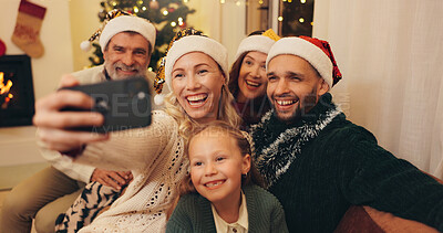 Buy stock photo Christmas, happy and selfie of family and child in home take photo for profile picture, social media and memory. Grandparents, smile and mom, dad and girl for festive tradition, holiday and vacation