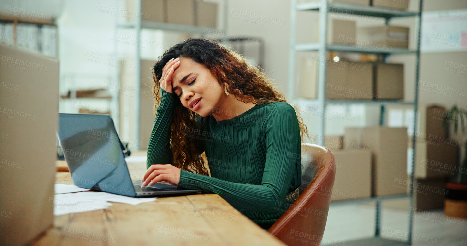 Buy stock photo Frustrated woman, laptop and headache with mistake for logistics, transport inflation or complex tax structure. Upset, female person or distributor with stress or anxiety at warehouse for labor costs