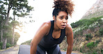 Woman, runner and exhausted in road, nature and breathing with sweat, tired and training for fitness in summer. Girl, fatigue and burnout with exercise, workout and outdoor by mountains in Costa Rica